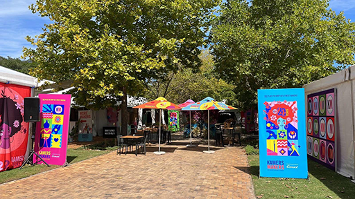 Pull-up banners displayed at an outdoor fair.