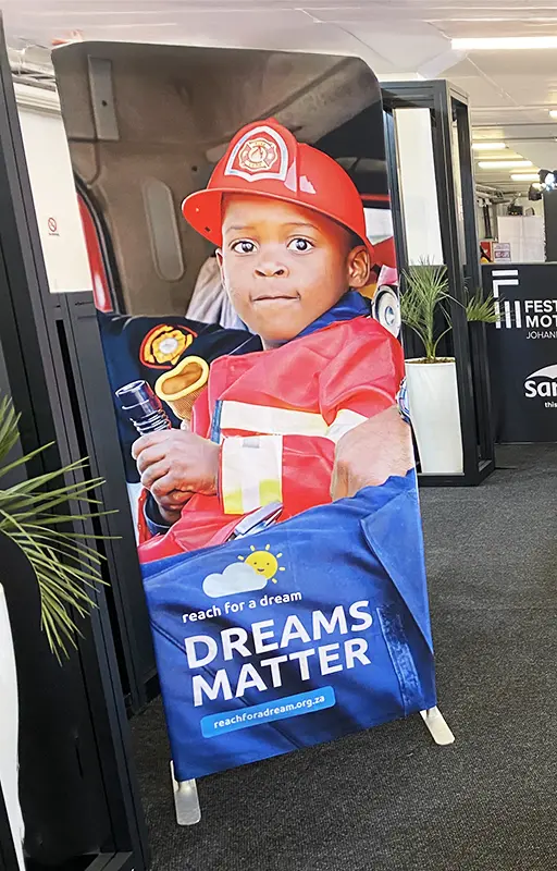 A sock banner at The Festival of Motoring printed for Reach For a Dream.